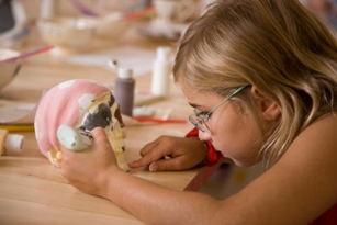 Painting a skull money bank_small.JPG